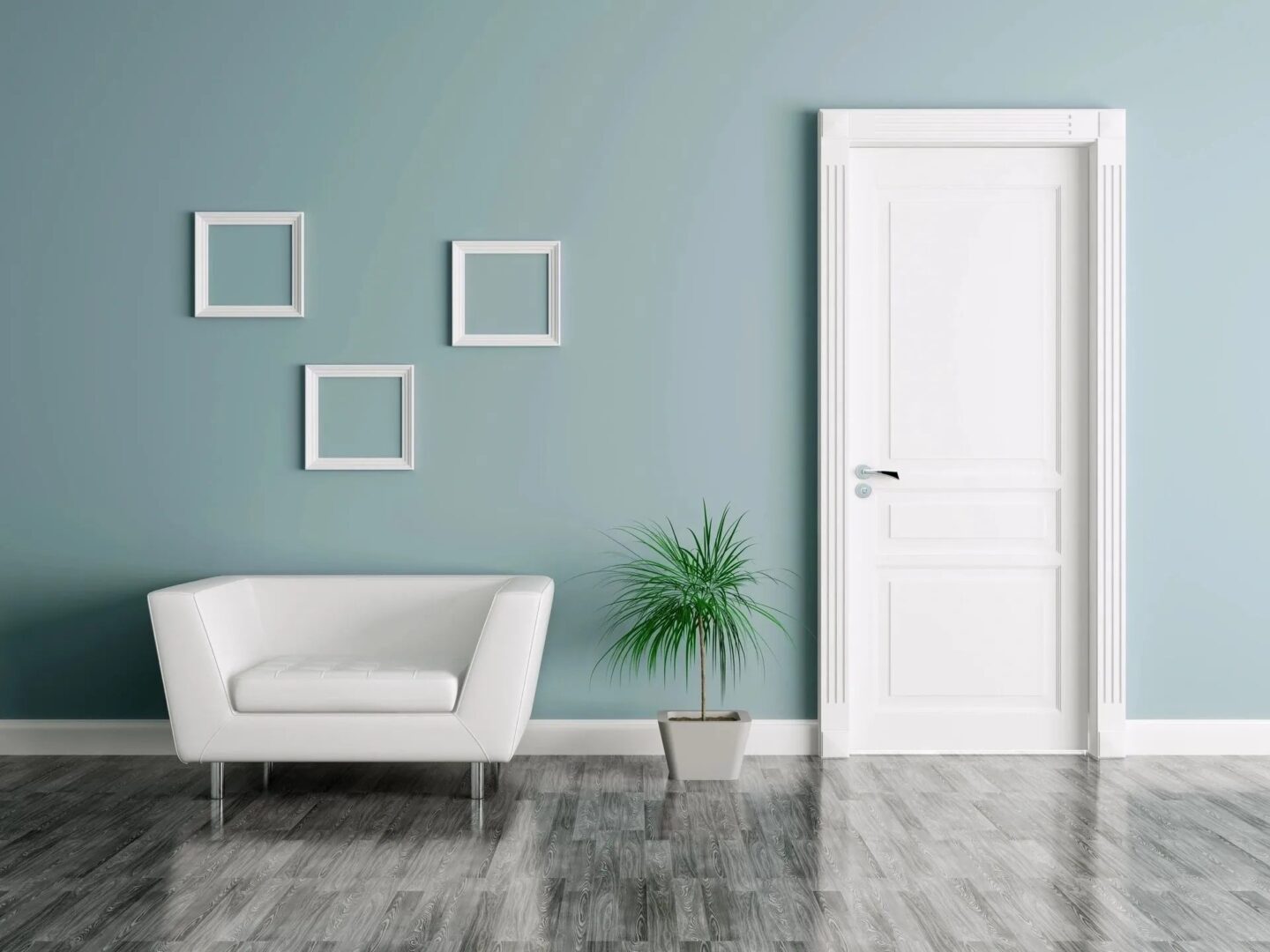 A room with a white chair and a door